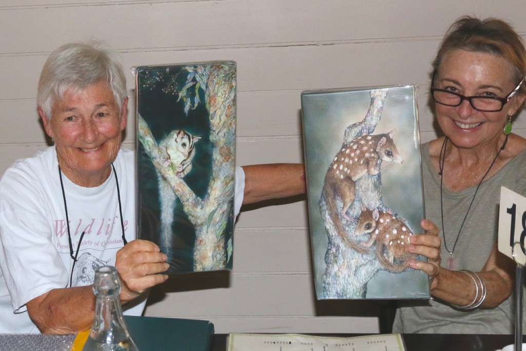 Jane, and fellow member Trish,  displaying her wildlife prints. Photo Malcolm Tattersall. 